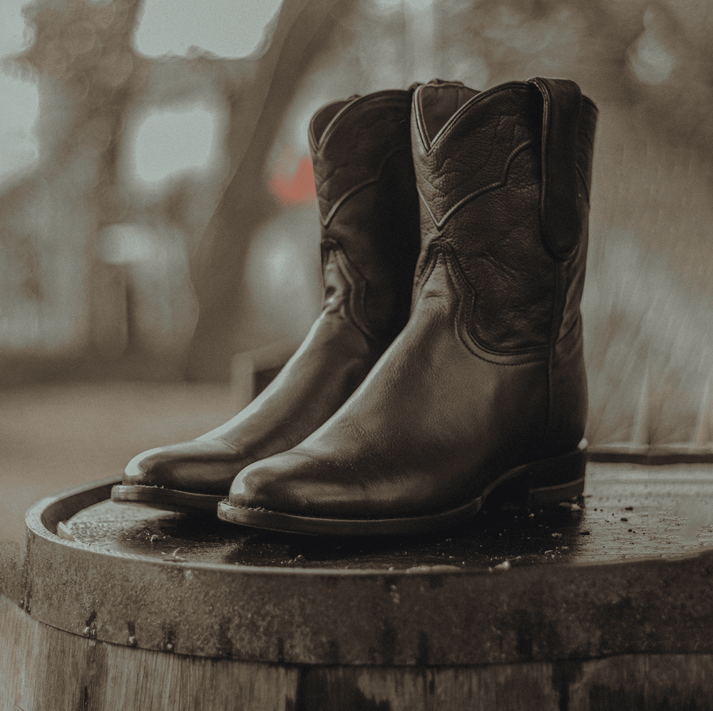 Black Chisos No. 6 wedding roper cowboy boots displayed outdoors