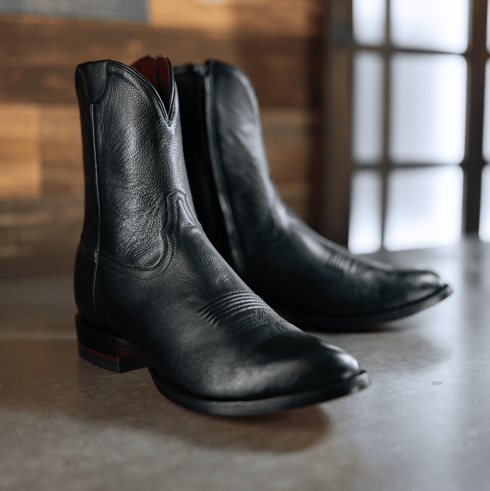Chisos No. 7 zipper wedding cowboy boots displayed on table