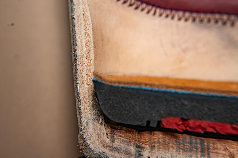 The heel counter and leather insole in cross section